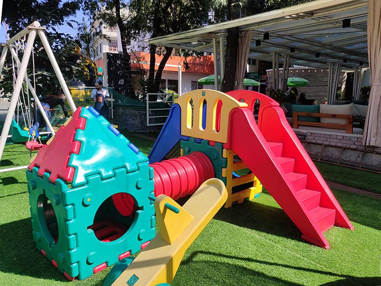 Outdoor play area for kids at Rumi's Bistro one of the best family restaurants in Kathmandu