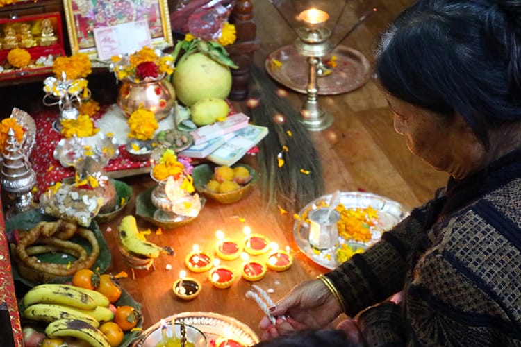 A women performs Laxmi Puja in Nepal