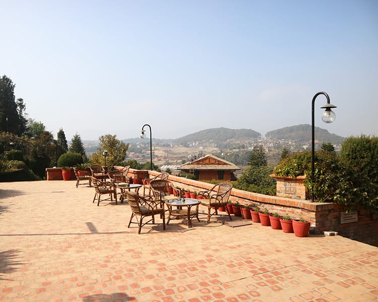 The top patio at the Godavari Village Resort in Nepal which overlooks the nearby hills
