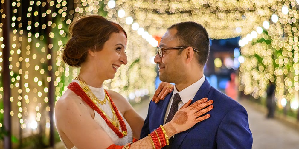 Michelle Della Giovanna from Full Time Explorer at her wedding with husband Suraj Pradhan