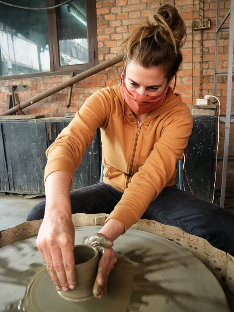 Andrea working her magic at the pottery wheel during a pottery class in Kathmandu