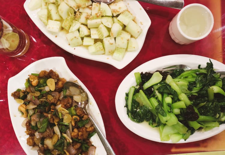 Bok choy, cucumber salad and kong pow chicken with cashews from Old Lan Hua Chinese Restaurant in Pokhara