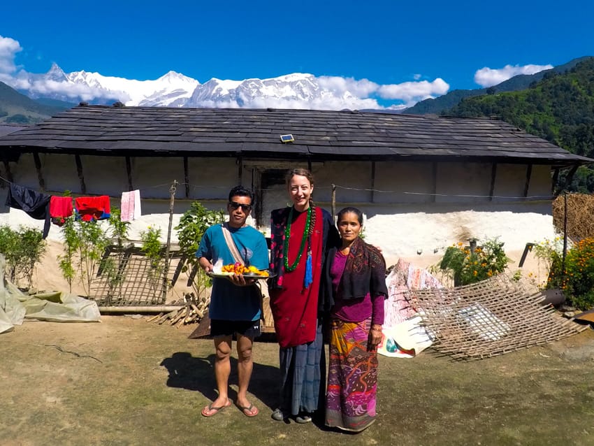 Michelle Della Giovanna from Full Time Explorer and her Gurung homestay hosts during Tihar