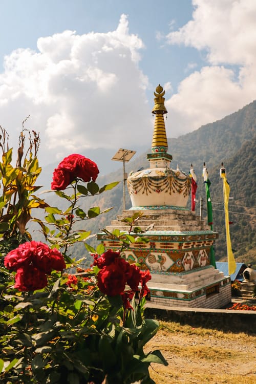 A buddhist stupa at the top of the hill