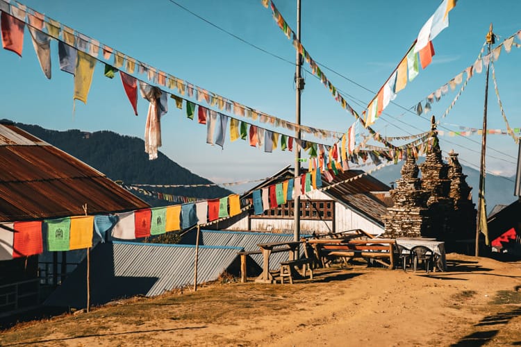 Prayer flags in front of Sing Gompa in Chandanbari