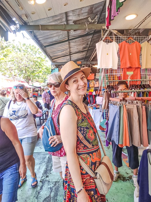 Michelle Della Giovanna walking around Chatuchak Weekend Market in Bangkok