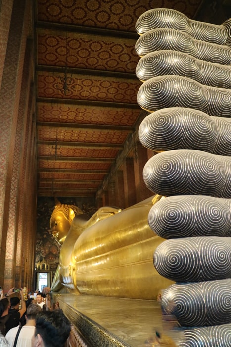 The giant reclining Buddha at Wat Pho in Bangkok - Best Things to do in Bangkok