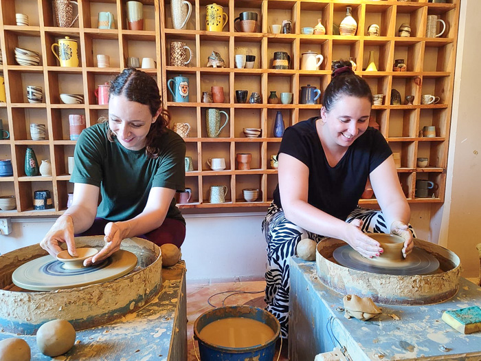 Michelle and Emma making pottery