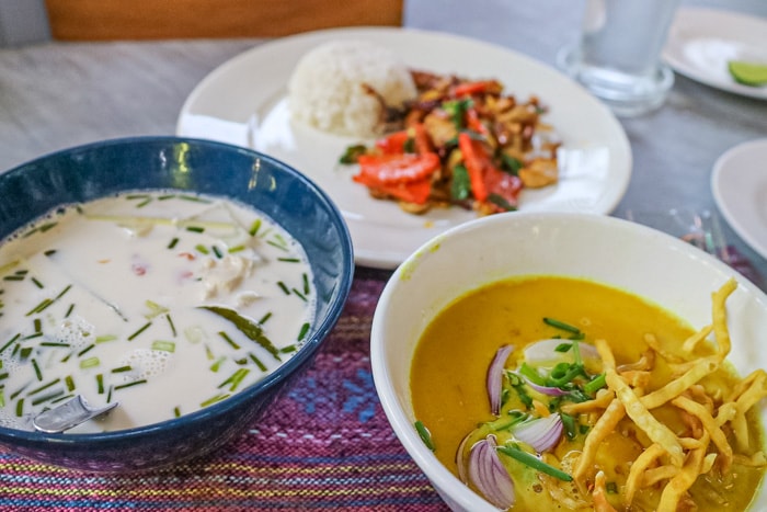 Thai soup, curry and stir fried chicken made in a cooking class in Chiang Mai